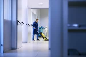 lady cleaning a building after hours