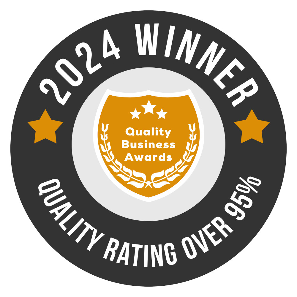 Celebratory graphic displaying 'Quality Business Awards' with badge design, and stars, symbolizing excellence and service by Gulf South Janitorial.