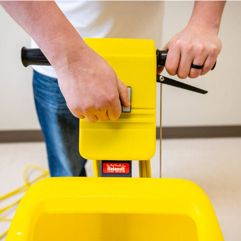 gulf south janitorial technician running a floor buffer